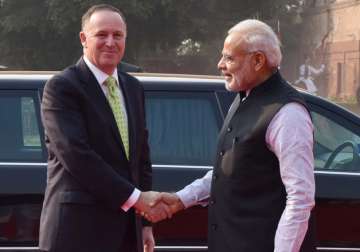 PM Modi shakes hand with his NZ counterpart John Key