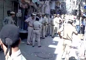 Delhi Police personnel arrive in Naya Bazar where an explosion killed one person