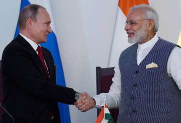 PM Narendra Modi and Vladimir Putin at the agreement exchange ceremony