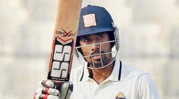 Wriddhiman Saha's half-century takes India's lead to a massive 371