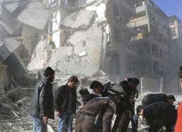 Damaged building after airstrikes in Aleppo, Nov 19