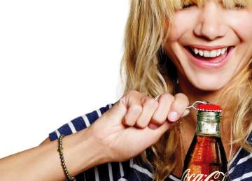 A Coca-Cola bottle that clicks a selfie in a jiffy