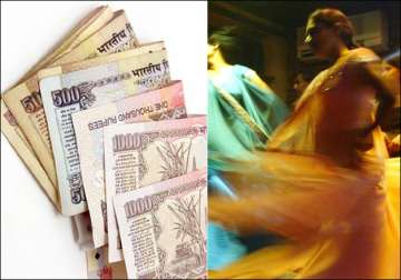 File pic - Old Rs 500, Rs 1000 notes, a view of dance bar in Mumbai