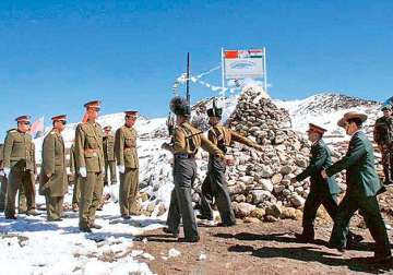 File photo - Indian and Chinese soldiers meet at the Indo-China border.
