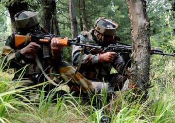 File pic - Indian jawans takes position near an Army base in Kashmir 