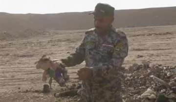 Iraqi troops discover mass grave near IS-held Mosul