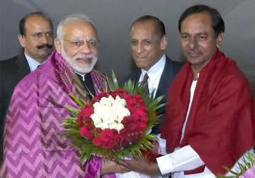 PM Modi being received by Chandrashekhar Rao on his arrival 