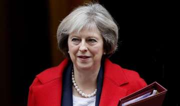Theresa May wins Brexit timetable vote in Parliament