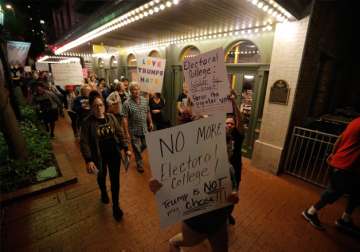 Protesters march in opposition of Donald Trump's win in Texas.