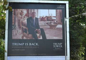 A billboard of luxury residential apartment complex Trump Tower in Mumbai