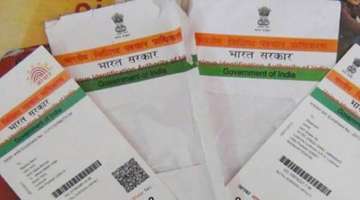 Aadhaar to be mandatory for income tax returns, PAN card applications