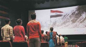 Three, including two women roughed up in theatre for 'insulting' national anthem