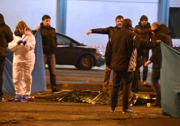 Italian police cordon off an area after killing Berlin Christmas market attacker
