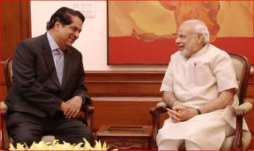 M V Kamath with PM Modi