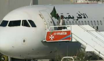 Libyan plane seizing ends peacefully as hijackers surrender