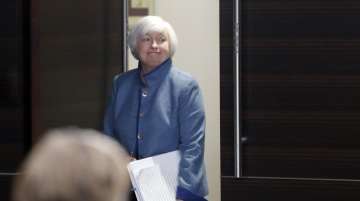Federal Reserve Board Chair Janet Yellen arrives for a news conference