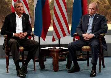 File pic of Barack Obama and Vladimir Putin 