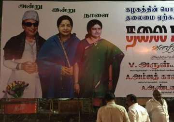 A poster requests Sasikala to take up the leadership of AIADMK.
