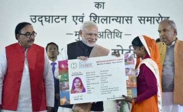 PM Modi felicitates beneficiaries of different govt Schemes in Varanasi