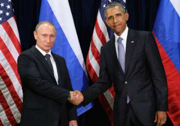File pic - Vladimir Putin and Barack Obama