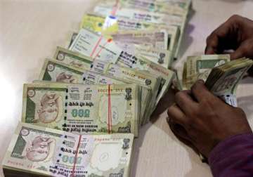 File pic - A bank official counts scrapped Rs 500 notes