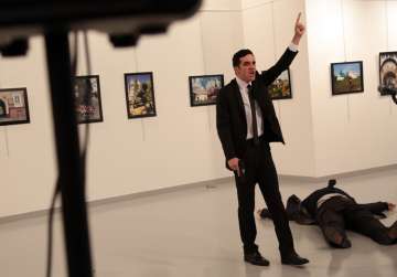 Russia's ambassador to Turkey Andrei Karlov killed in a gun attack