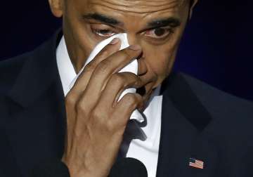 Obama wipes his tears as he speaks at McCormick Place in Chicago