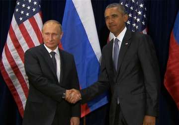 File pic - Vladimir Putin and Barack Obama 
