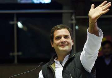 Rahul Gandhi waves during his address at the party's Jan Vedna Sammelan