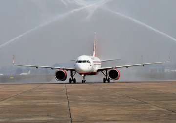 First Airbus 320 neo plane receiving a water cannon salute at Avionics Complex