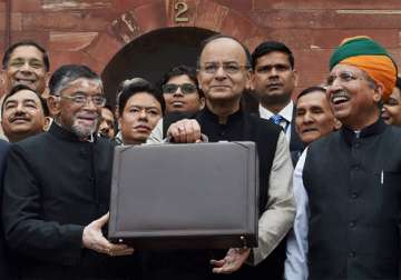 Jaitley stands outside his office at North Block
