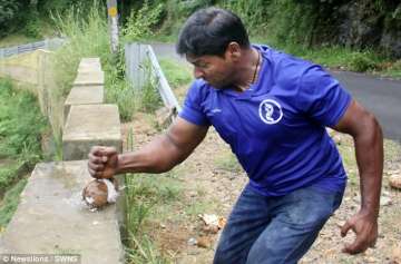 Kerala man world record, coconut smashing record