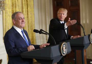 Donald Trump and Benjamin Netanyahu participate in a joint news conference