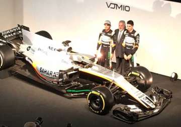 Vijay Mallya appears in UK for launch of Formula One car