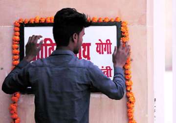 A new nameplate is placed at the entrance of 5 Kalidas Marg