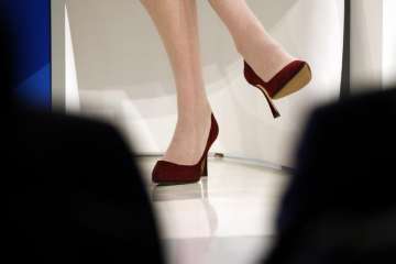 UK lawmakers debate on whether high heel dress codes are sexist