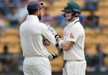 Virat Kohli with Steven Smith during the second Test match