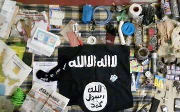 The items recovered from the Lucknow encounter site included an ISIS flag 