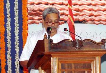 Manohar Parrikar taking oath as Goa's new CM at a swearing-in ceremony in Panaji