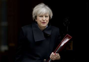 File pic - Theresa May outside 10 Downing Street in London