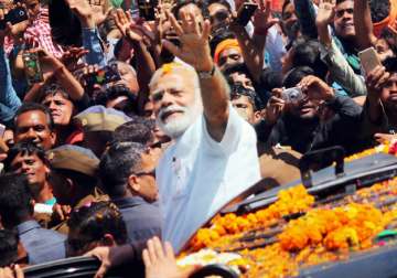 PM Narendra Modi during a road show in Varanasi 