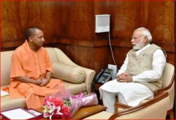 Yogi Adityanath with PM Modi