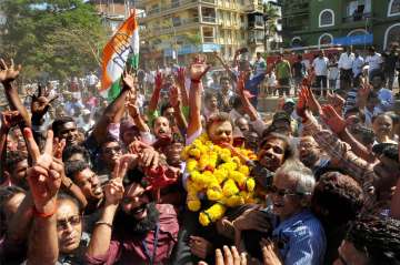 Congress' Nilakanth Halarankar celebrates his win in Goa election results