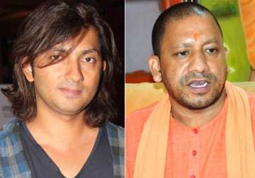 File pic - Shirish Kunder and Yogi Adityanath