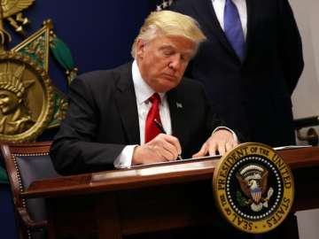  Donald Trump signs order to roll back Obama’s climate change measures 