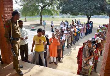  People at a polling booth to cast their vote in UP
