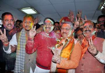 Shyam Jaju with Ramesh Pokhriyal Nishank celebrating party's win in U'khand