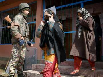 File pic -  Women coming out after casting their vote in Budgam