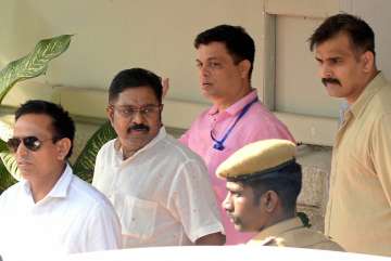 TTV Dhinakaran with Delhi Police officials in Chennai on Thursday