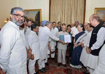 Modi govt spreading fear, Opposition tells President Mukherjee